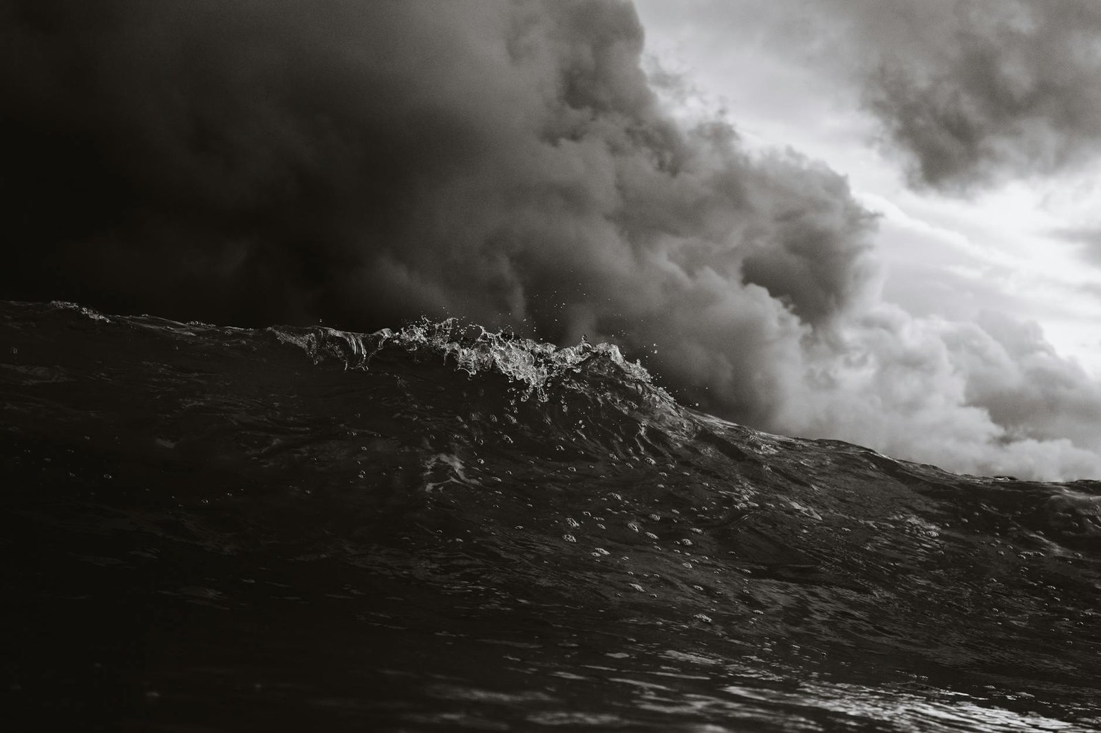 grayscale photo of body of waves